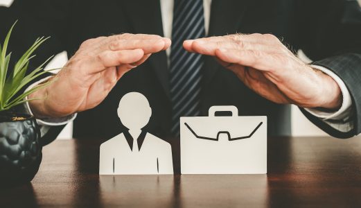 Insurer protecting an employee and a briefcase with his hands